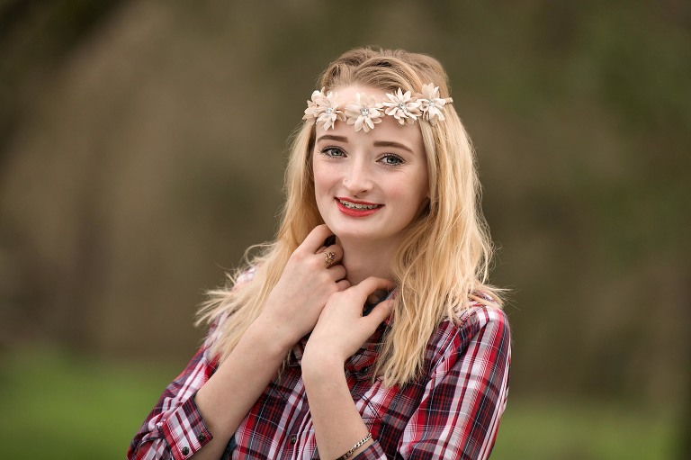 high school senior girl with flower headband